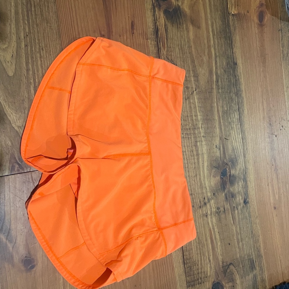 ORANGE 2.5 INSEAM SIZE 2 SPEED UPS. bought used. good condition